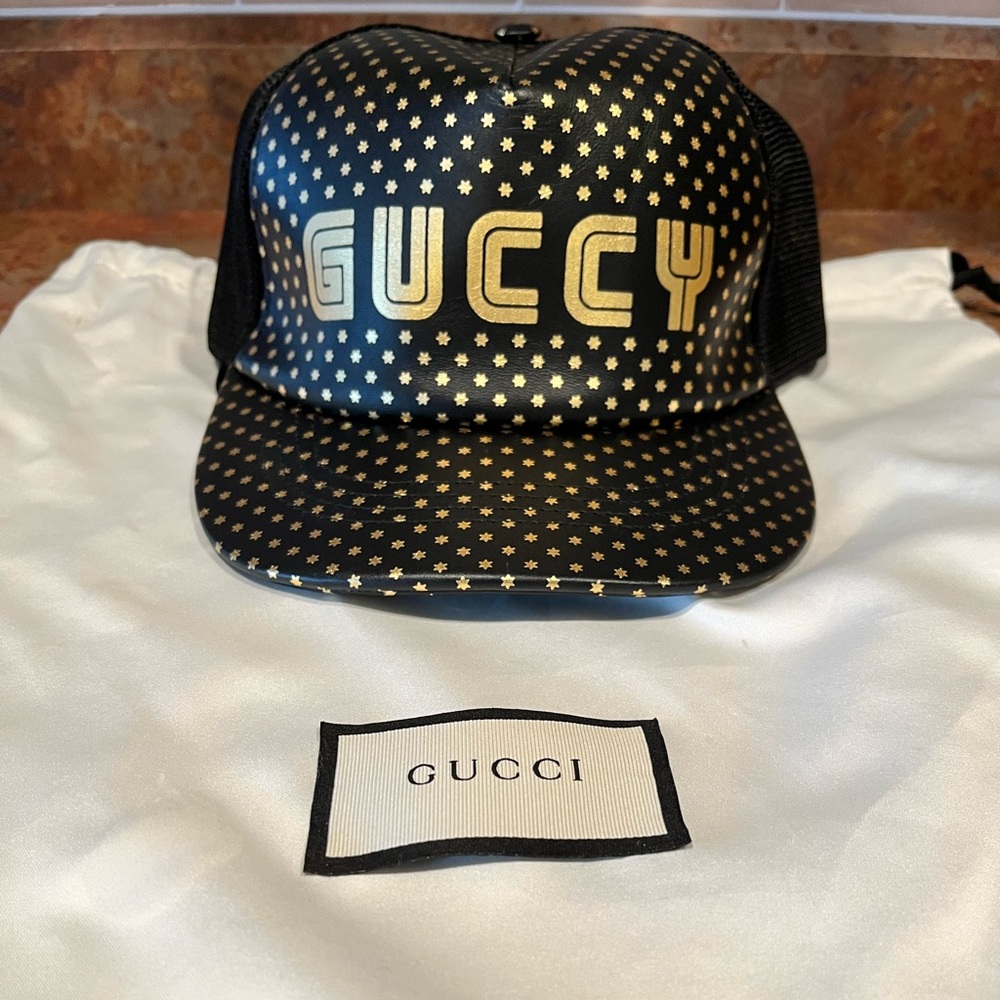 Authentic leather Gucci hat black and gold